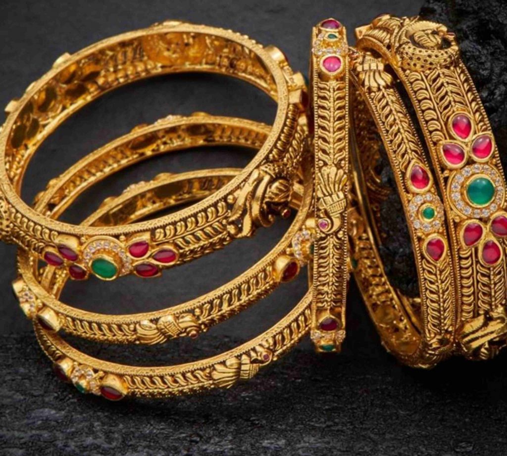 Stunning Antique Gold Bangle Designs with Dazzling Stones